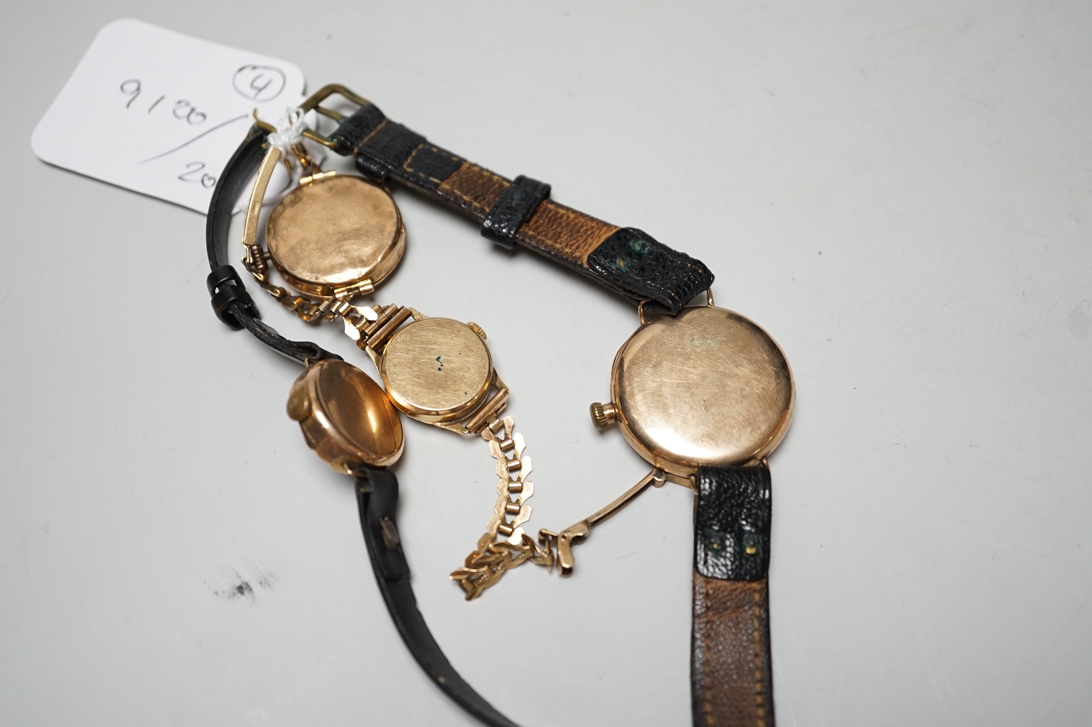 A lady's 9ct gold Timex manual wind wrist watch, on a 9ct gold bracelet, gross weight 1.8 grams and three other yellow metal wrist watches including a 9ct gold Waltham.